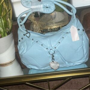 Blue Shoulder Bag with Silver Accents and Heart Charm